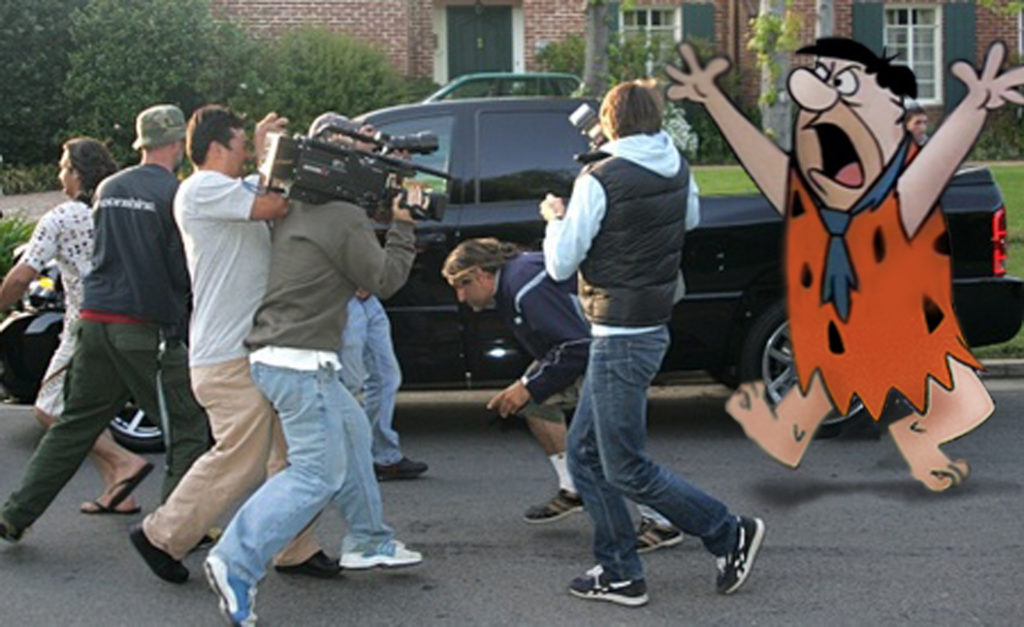 Fred Flintstone attacks paparazzi outside his Hollywood home this week